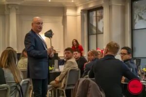 ashley boroda speaking to a seated audience