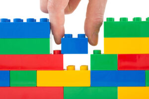 toy bricks wall full-frame closeup last piece