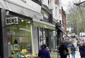 busy restaurant and retail high street showing foot traffic in a hospitality district